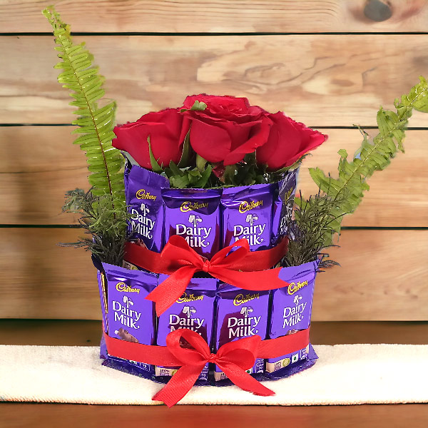 Layered Dairy Milk Chocolates with 4 Red Roses Gifts to Nepal Giftmandu